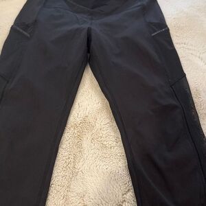 Lululemon size 12 leggings with pockets and mesh lower sides